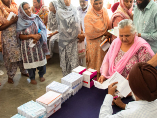 2026-free-medical-camp-bakhshish-international-charitable-society-nussi-jalandhar-02 Distribution of free prescribed eye drops to patients after their eye screening at Gurdwara Bakhshish Dham