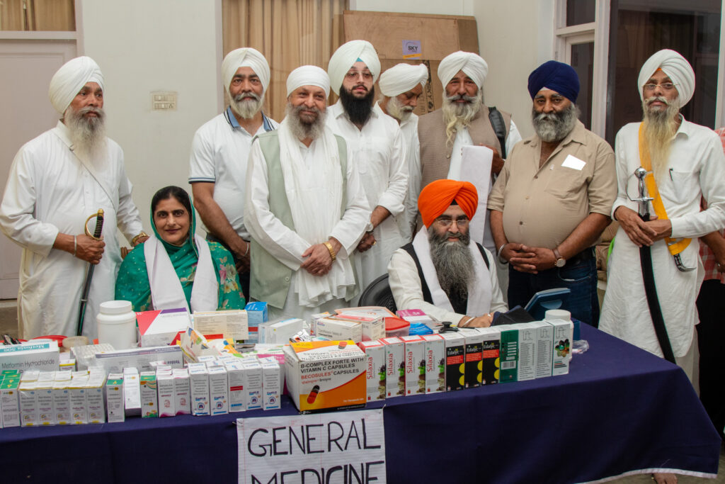 2026-free-medical-camp-bakhshish-international-charitable-society-nussi-jalandhar-11 Baba Daljit Singh Ji (Amritsar) at the general medicine cabin during the free medical camp